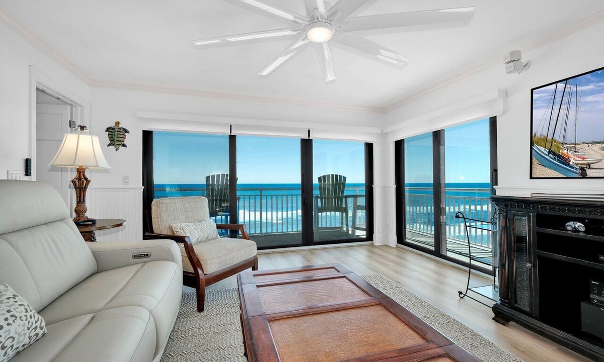 New Smyrna Beach Condo | Luxury, direct oceanfront 2/2, top-floor corner with wrap-around balcony and heated pool