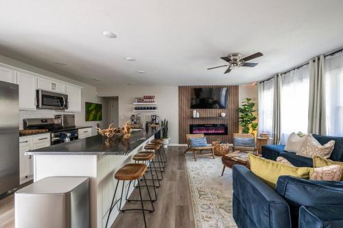 Lee's Summit Villa | Modern Luxe 3B2B - Hot Tub - Game Room - EV Charger - Walk to Downtown LS