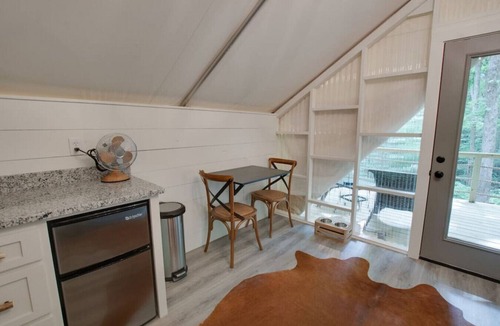 Groveoak RV Rental | #10 The Lodge Luxury Glamping Tent Hunting Theme