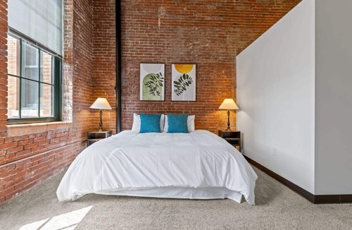 Strip District Apartment | 2BR Historic Loft Oasis With Pool & Gym