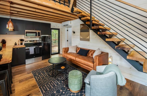 Highlands Cabin | A-Frame Treehouse with Giant Treetop Net - The Carpentree