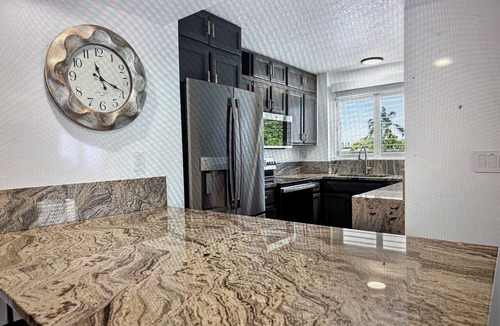 Bella Vista Villa | Beach Bungalow Jupiter Carlin Park across street from beach Htd Pool/Pickle Ball