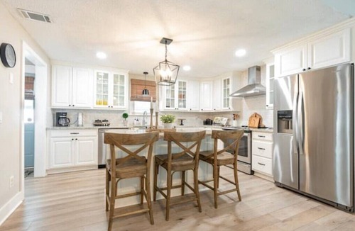 Garden City House | Beach House Captains Cove 3 BD, 2 BA, Linens & Golfcart included Lanai on Canal