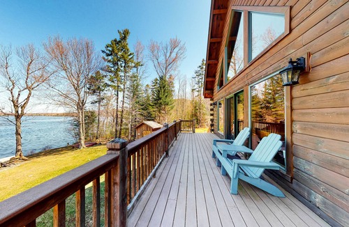 Northeast Somerset House | Dog-friendly lakefront cabin with covered porch & firepit on the shore