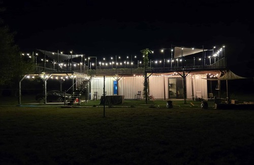 Wagoner House | Eco-Chic Container Tiny Home + Treehouse Deck