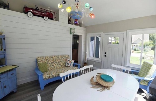 Dodds Addition House | Elegant Coastal Living: Screened-In Porch, Fire Pit, & A Short Walk to the Beach
