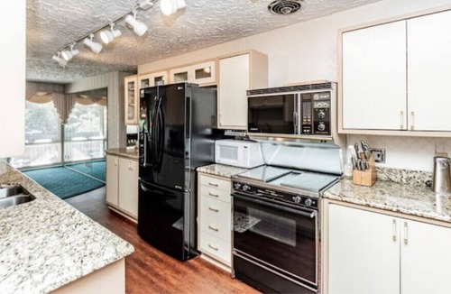 North Central Omaha House | Frank Lloyd WrightishMid Century Mod Time Capsule