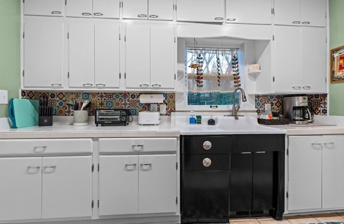 Walnut Street House | Fully Fenced Yard, Dogs Welcome, Near MSU, Mercy, and Cox Hospitals