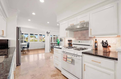 East San Mateo Apartment | Lakefront Lavender House 2BR w/ Water Views & Backyard Near SF