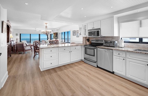 New Smyrna Beach Condo | Luxury, direct oceanfront 2/2, top-floor corner with wrap-around balcony and heated pool