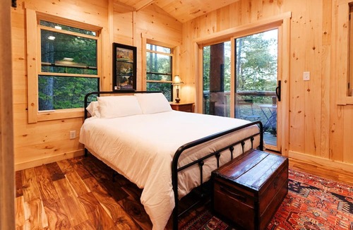 Zirconia Cabin | Magical Treehouse Stay with Creekside Sauna Experience in Zirconia, North Carolina