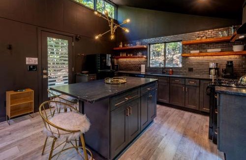 The Woods House | Modern Forest Cabin with Hot Tub, Screened Porch & Resort Access Near Hedgesville, WV