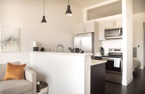 Milwaukee Apartment | Modern Studio Apt with Rooftop, Gym, and Parking - Sleeps 4