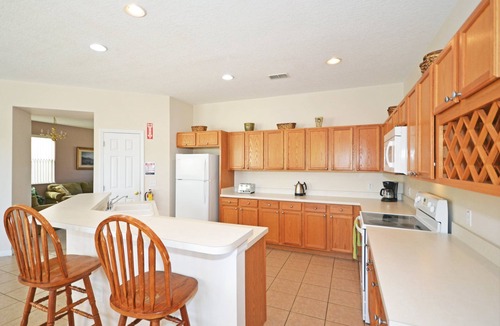 Windwood Bay House | Private pool with waterfall feature. Popular 4 bed, 3 bath villa in Windwood Bay