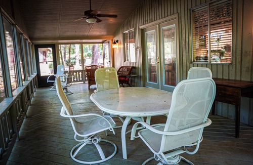 Pine Mountain Ski Chalet | Relax on your screened in porch in this pet friendly chalet!