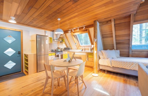 Baring Cabin | River Runs Through this secluded A-Frame, hot tub