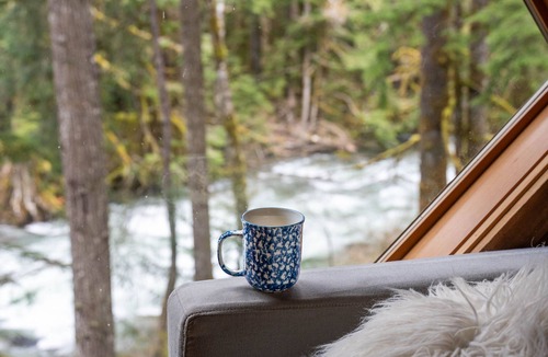 Baring Cabin | River Runs Through this secluded A-Frame, hot tub