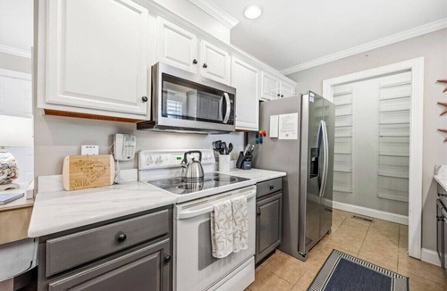 Garden City House | Spacious 3rd Row Beach House with a Heated Pool & Hot Tub
