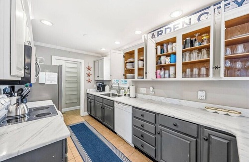 Garden City House | Spacious 3rd Row Beach House with a Heated Pool & Hot Tub