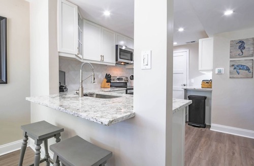 Palmetto Dunes House | Steps to Beach, Community Pool & The Dunes House! Renovated End Unit Villa w/Patio & Balcony.