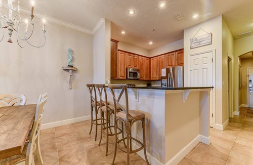 Palm Coast Condo | Stylish Condo with Heated Pools, Gym and Balcony Dining