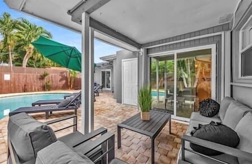 Middle River Terrace House | Sunny Days Getaway, 5BD Heated Pool Family Home!