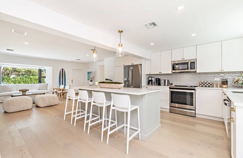 Southside House | Surf side retreat w/heated pool & beach steps