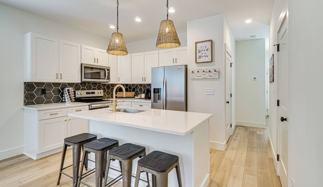 2 Mi to UT: Modern Retreat w/Covered Porch