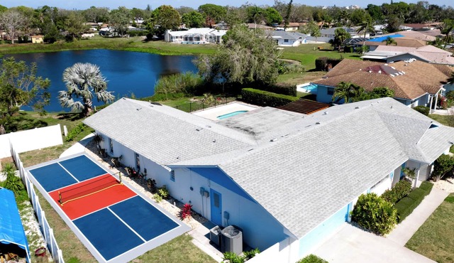 Pond-side 4BR Oasis w/Private Pool + Pickleball!