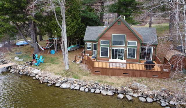 Private waterfront with stunning views, wrap around deck, and a dock for boating