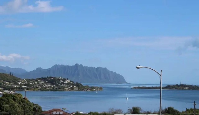 Quiet oasis with fabulous ocean, bay and mountain views, nestled in lush nature